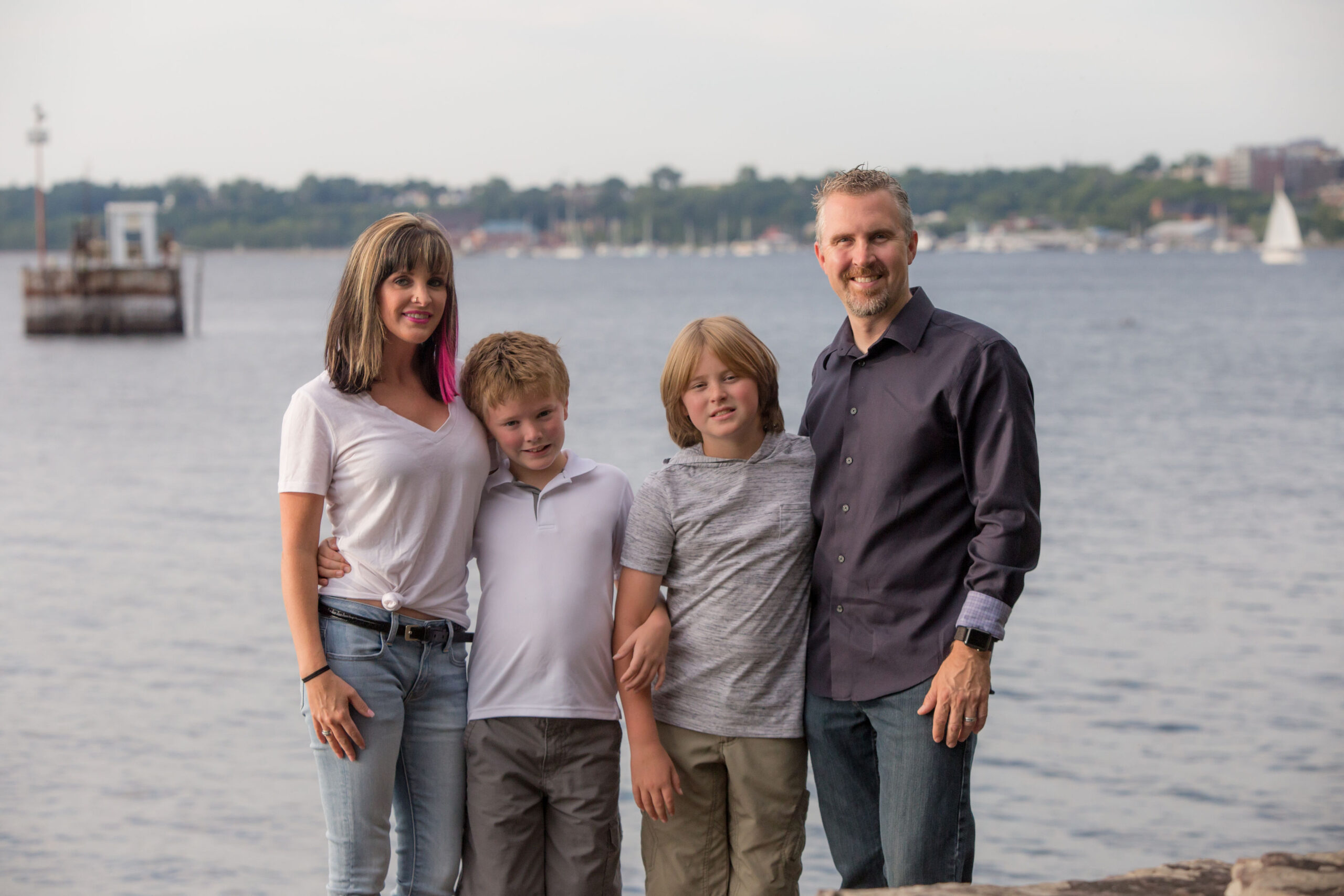Family portrait with lake in background